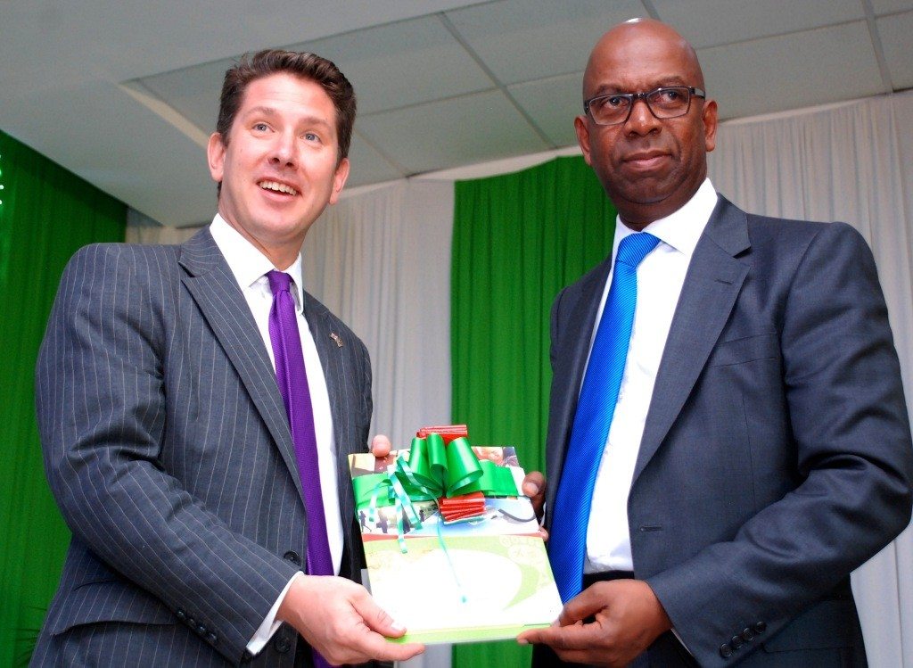 British High Commissioner to Kenya Christian Turner and Safaricom CEO Bob Collymore