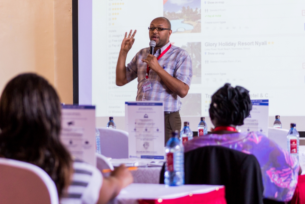 Yared Kifle Head of Revenue Management East Africa during a training session with for hotel front desk staff reps