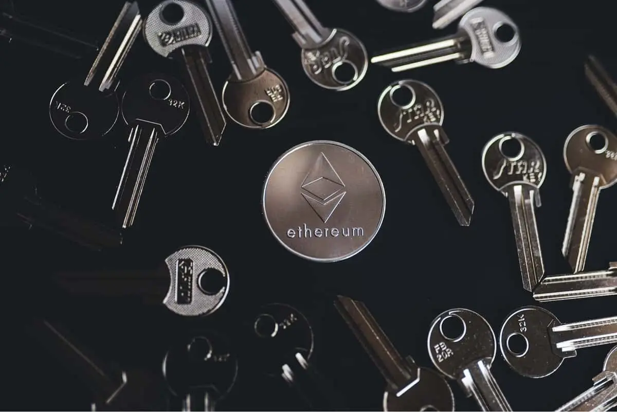 a bunch of keys in front of ethereum coin source https://unsplash.com/photos/iFYUdfD5zsE