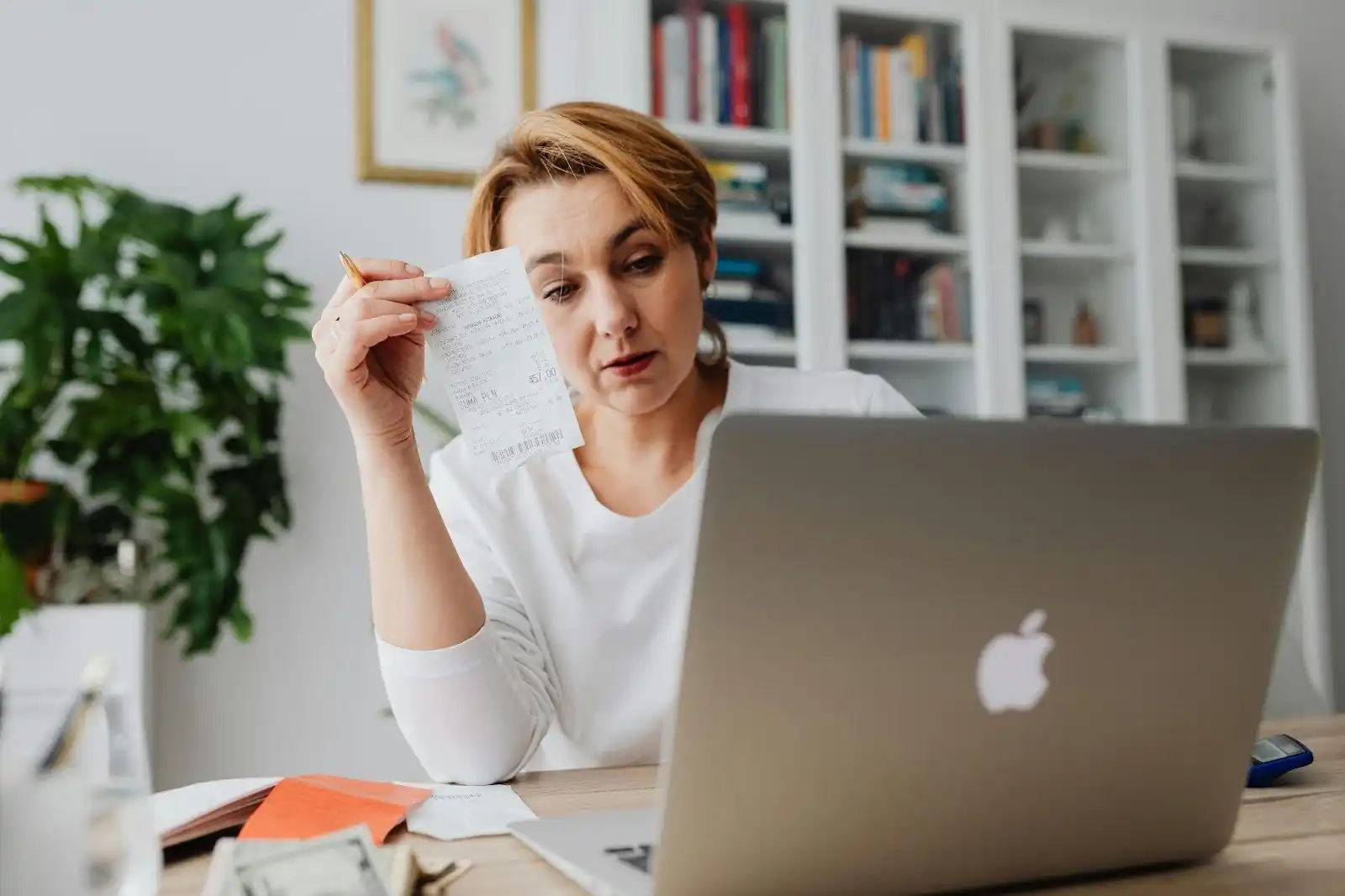 woman-calculating-her-receipts